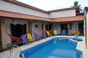 Casa em condômino, próxima à serra e ao mar